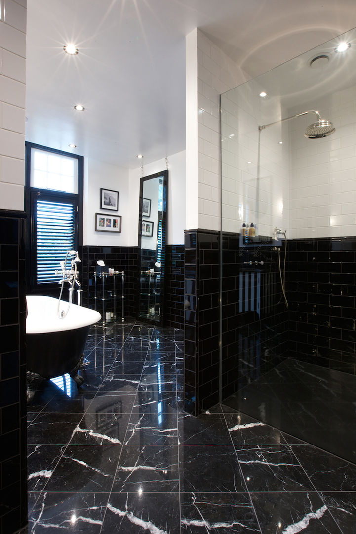 Nero Portofino Marble in a polished finish (designed by Sian Parry Jones). Artisans of Devizes Classic style bathroom