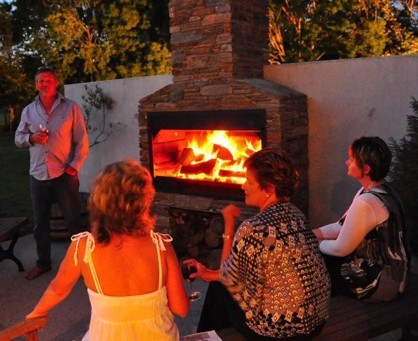 Utilisation of the Braai as a fire pit The Braai Man حديقة مواقد وشوايات