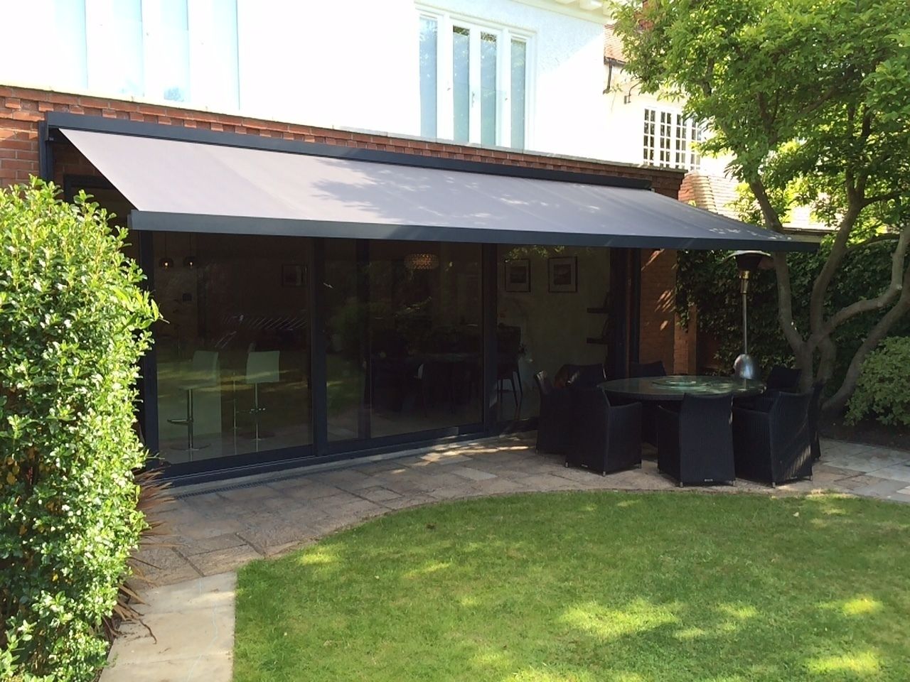 Patio Awning Installation in London. homify Balcones y terrazas modernos patio,awning,terrace,canopy,garden,alfresco,shading