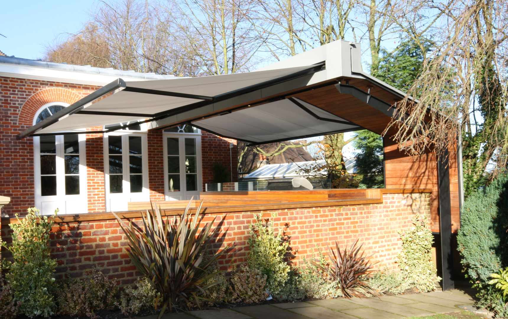 Patio Awning Installation in Cheshire. homify Modern Terrace patio,awning,terrace,canopy,garden,alfresco,shading