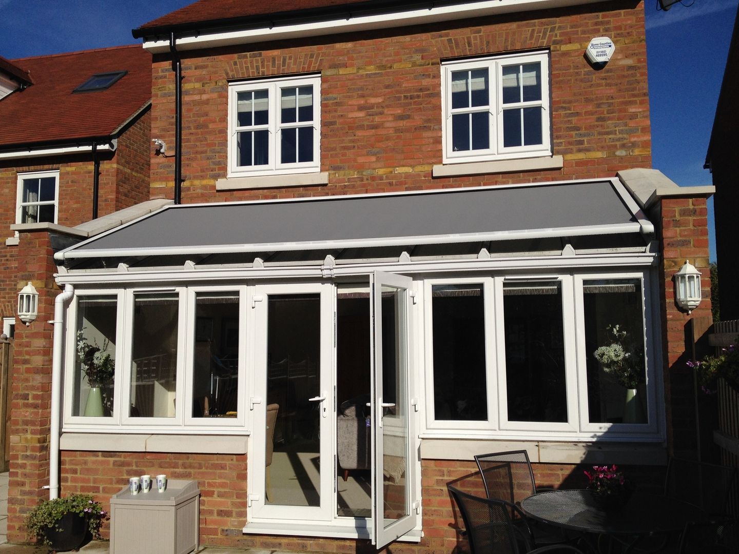 External Roof Blind Installation in Hertfordshire. homify Modern windows & doors Blinds & shutters