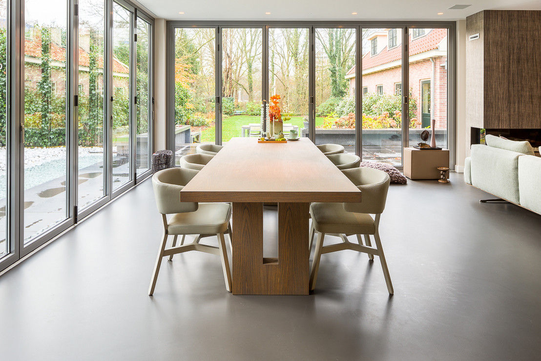 Woonkamers met een gietvloer, Design Gietvloer Design Gietvloer Ruang Makan Modern