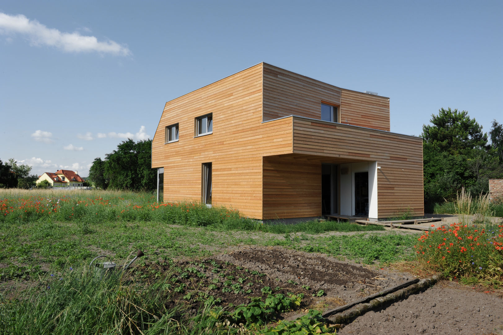 Nord-Ostfassade Symbios Architektur Moderne Häuser Holz Holznachbildung