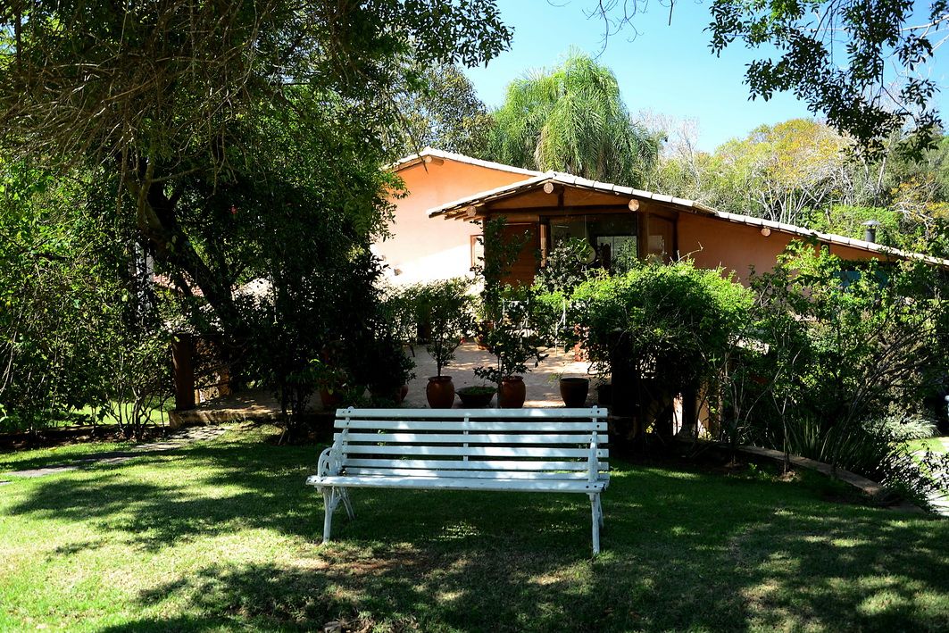 Casa do Bosque, Arquitetamos Escritório Autônomo Arquitetamos Escritório Autônomo Rustic style house