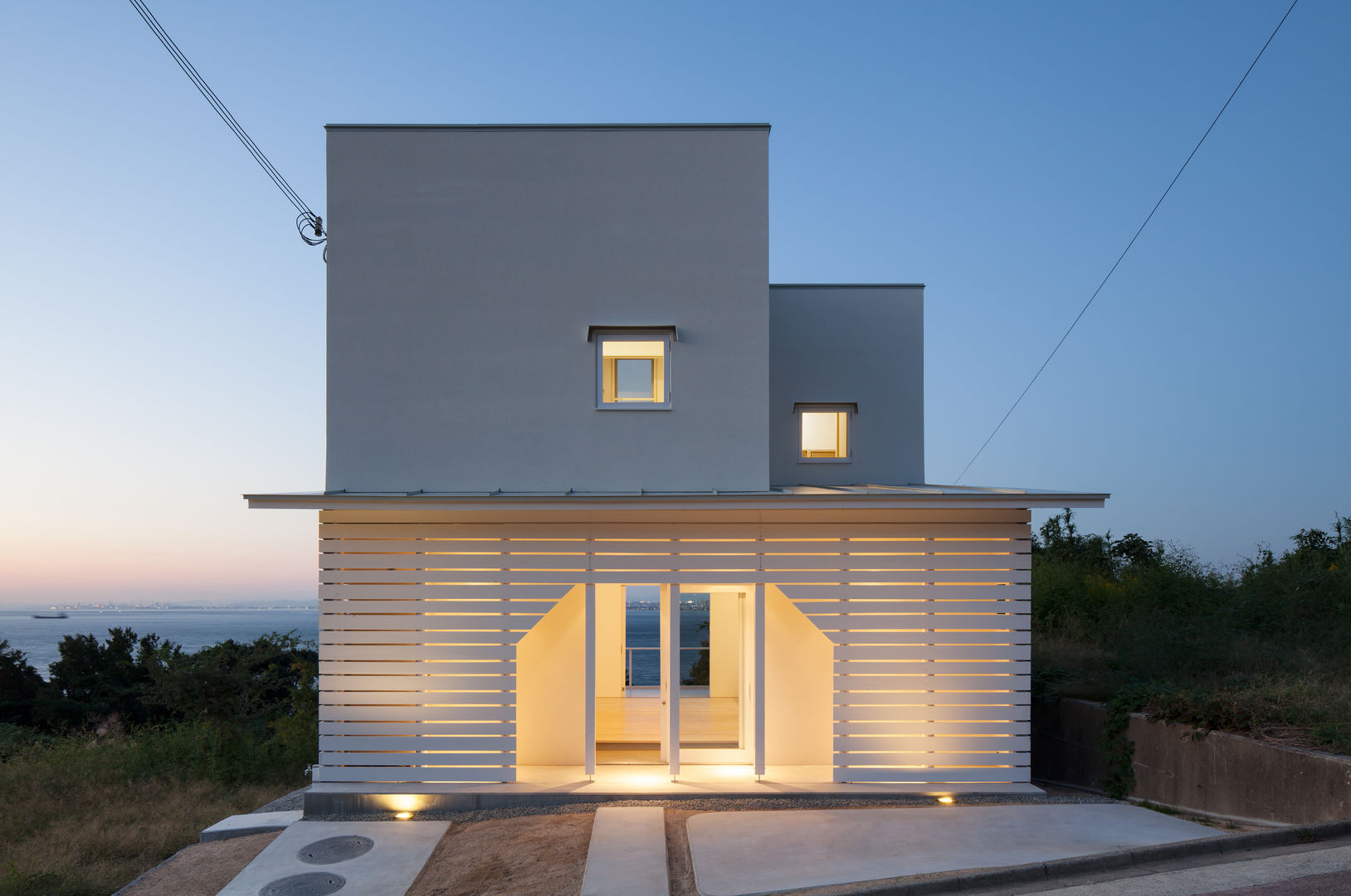 淡路島の家, IZUE architect & associates IZUE architect & associates 미니멀리스트 주택 우드 우드 그레인