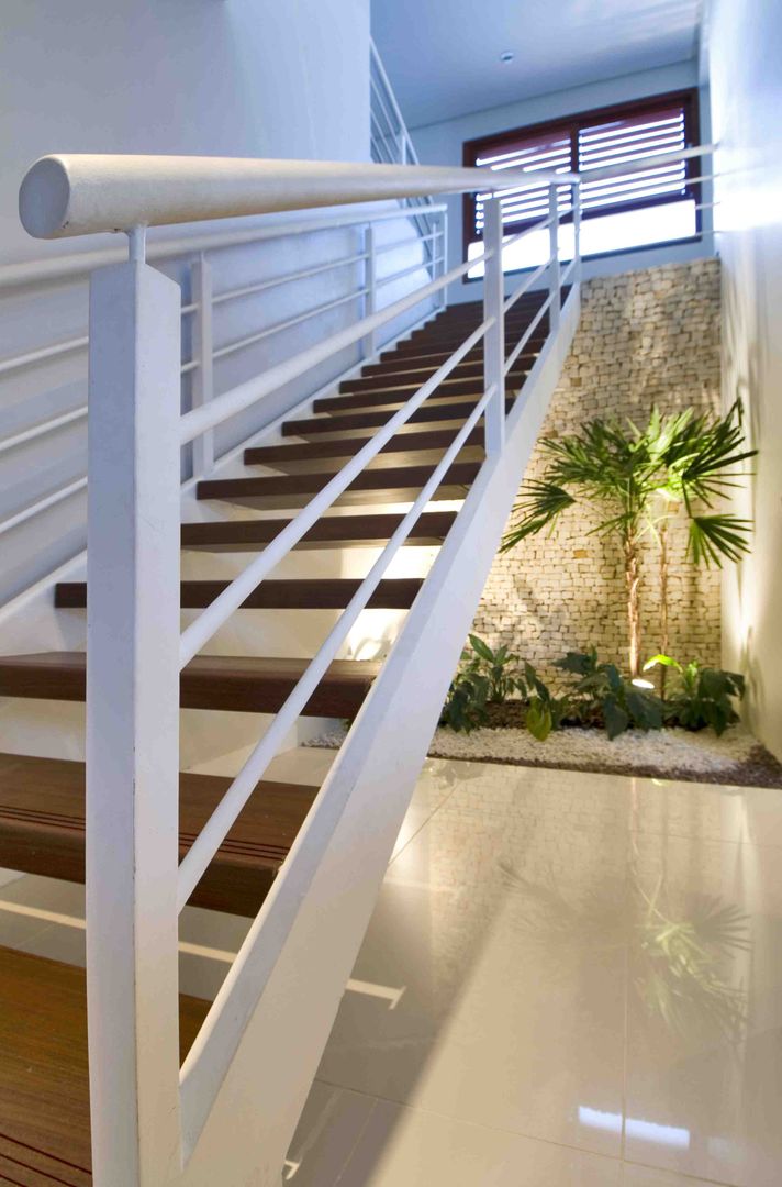 homify Tropical style corridor, hallway & stairs