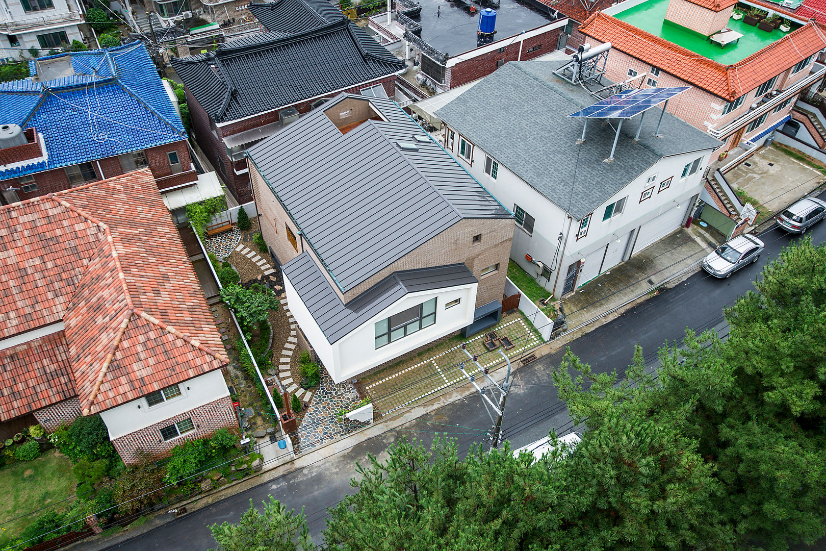 창원 재미있는 집 , (주)유타건축사사무소 (주)유타건축사사무소 Casas modernas Tijolo