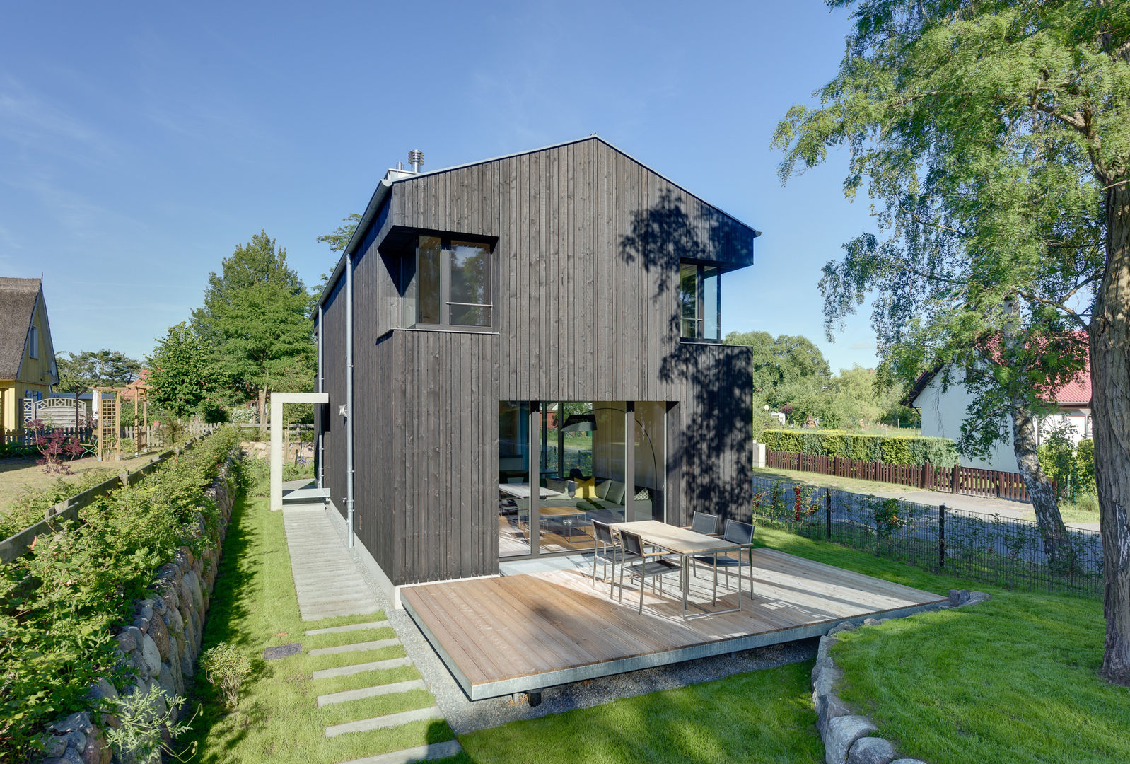 Modernes Ferienwohnhaus in Anlehnung an ein traditionelles Drempelhaus, Möhring Architekten Möhring Architekten Gable roof