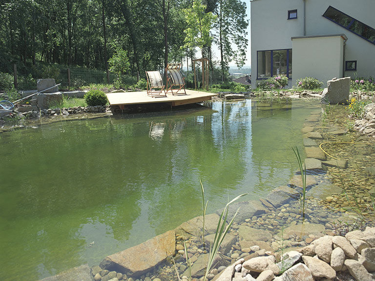 Garten mit Schwimmteich und Donaublick, Kräftner Landschaftsarchitektur Kräftner Landschaftsarchitektur Piscinas