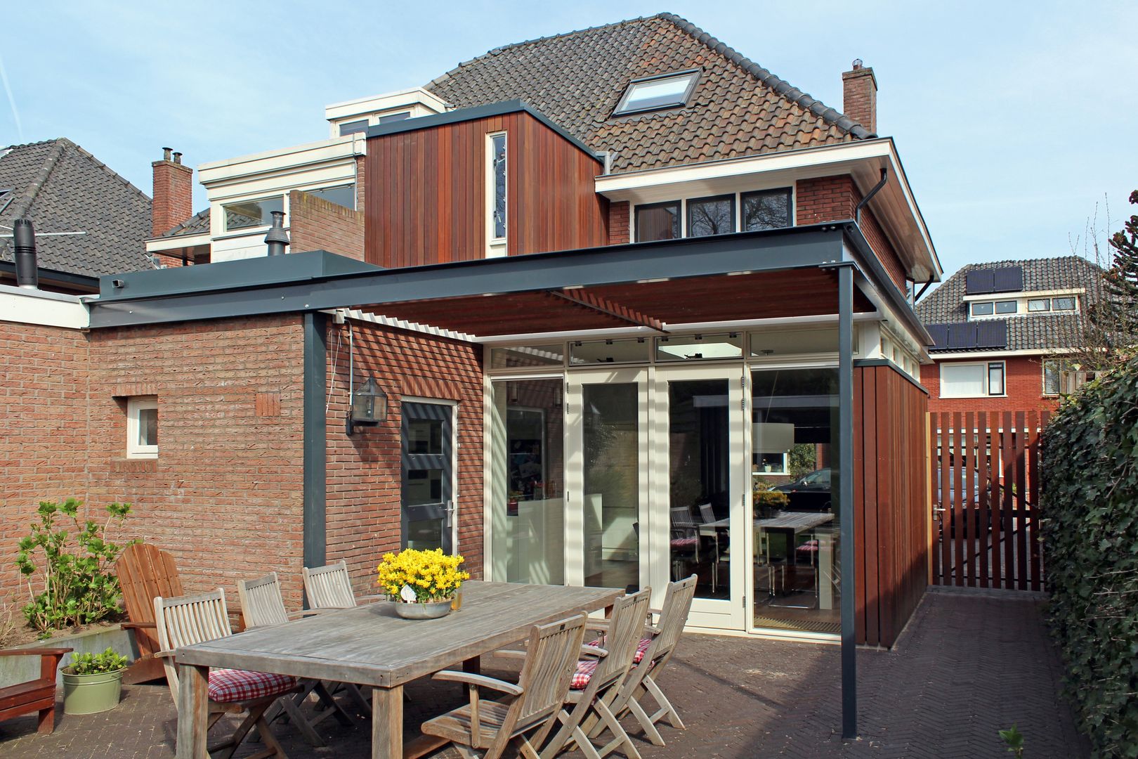 Moderne uitbouw aan een jaren dertig woning, Archimees Archimees