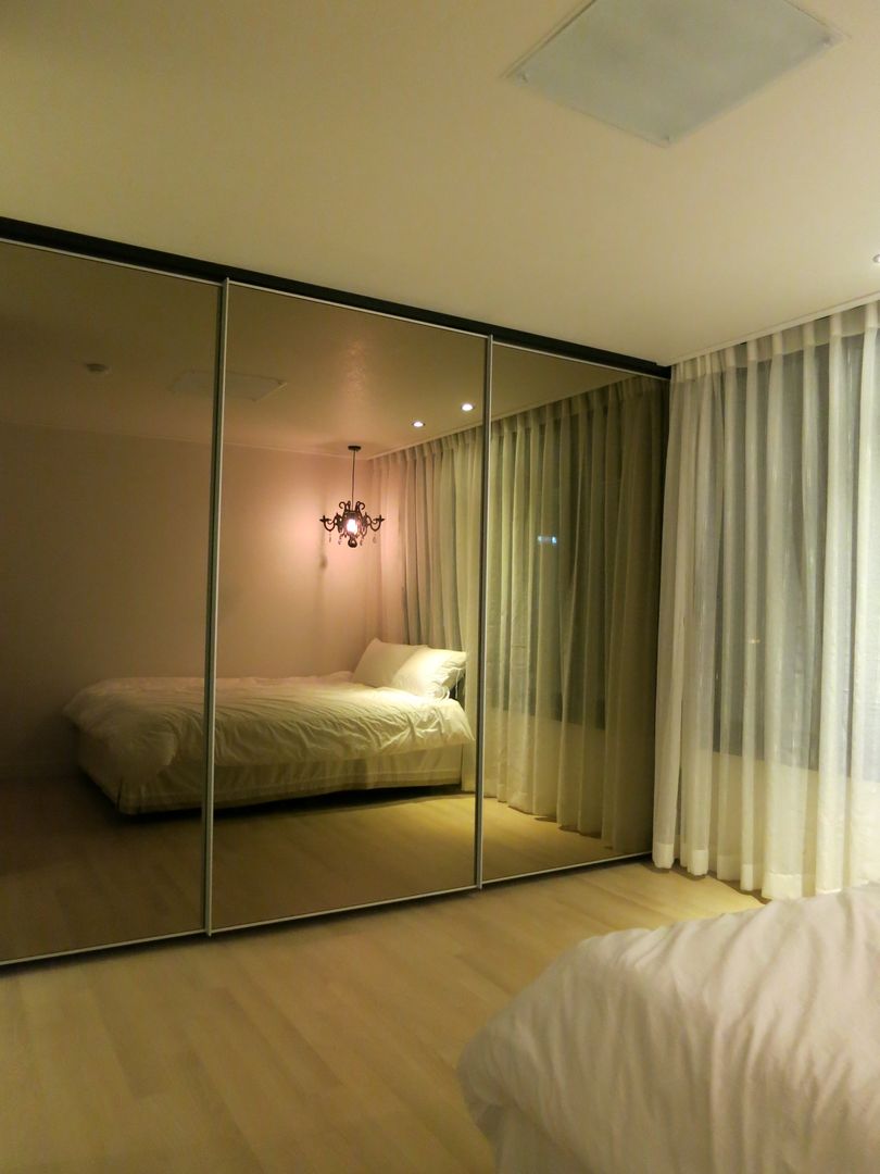 실용적인 수납과 공간활용 32py, 홍예디자인 홍예디자인 Modern style bedroom