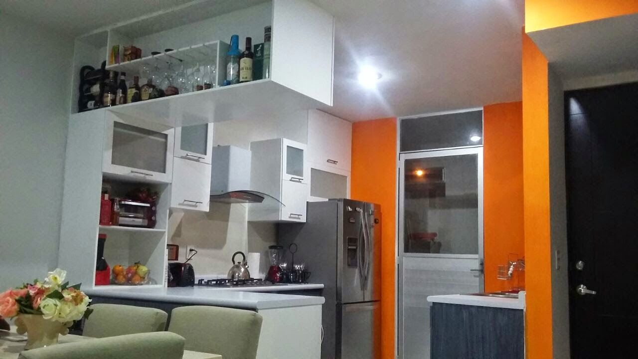 Cocina integral en un pequeño espacio., FLO Arte y Diseño FLO Arte y Diseño Cocinas de estilo moderno Aglomerado