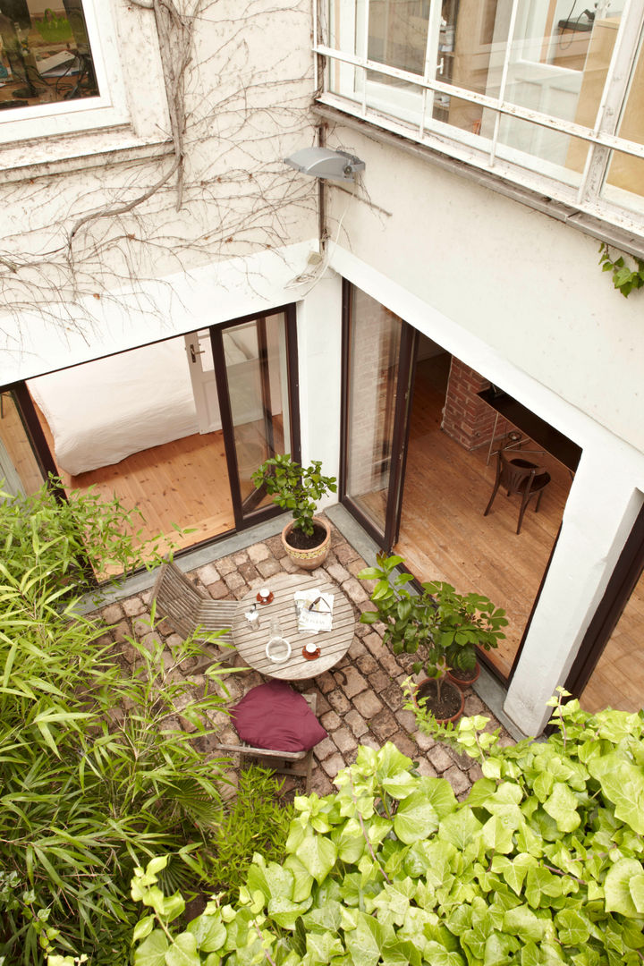 Patiowohnung, Wirth Architekten Wirth Architekten منازل