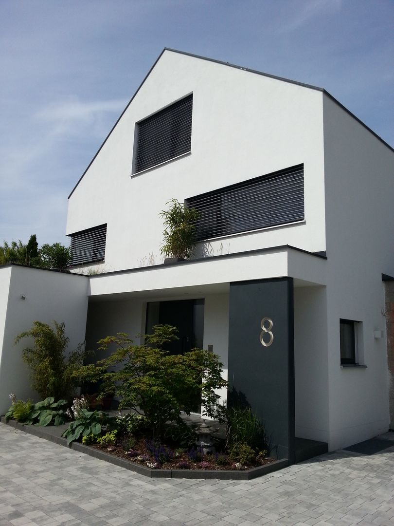 Lichtdurchflutet und gemütlich: Einfamilienhaus der besonderen Art, moser straller architekten moser straller architekten Casas modernas