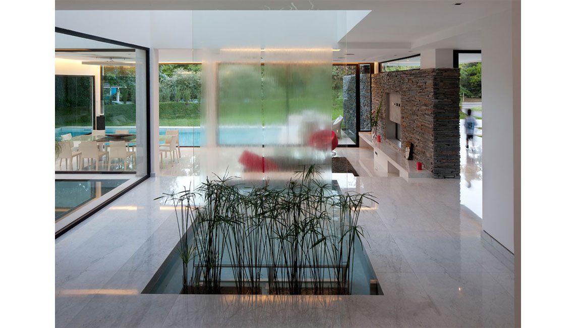 CASA CARRARA, Remy Arquitectos Remy Arquitectos Modern style conservatory