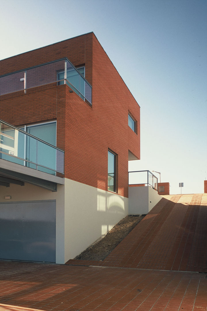 Pinhal Verde House , SAMF Arquitectos SAMF Arquitectos Дома в стиле модерн Кирпичи