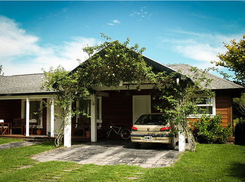 CASA AMUI Marayui Country Club Chauvín Arquitectura Casas de estilo rural Madera Acabado en madera