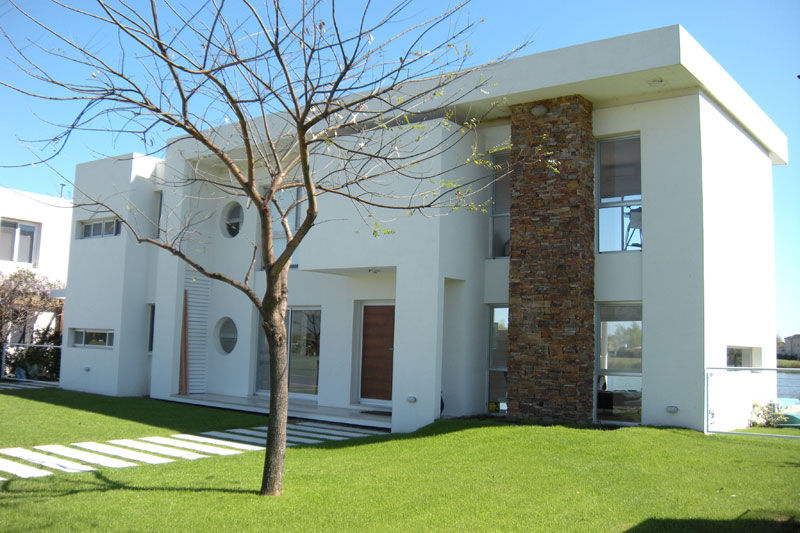 Casa San Isidro Labrador, arqpizzini arqpizzini Modern houses