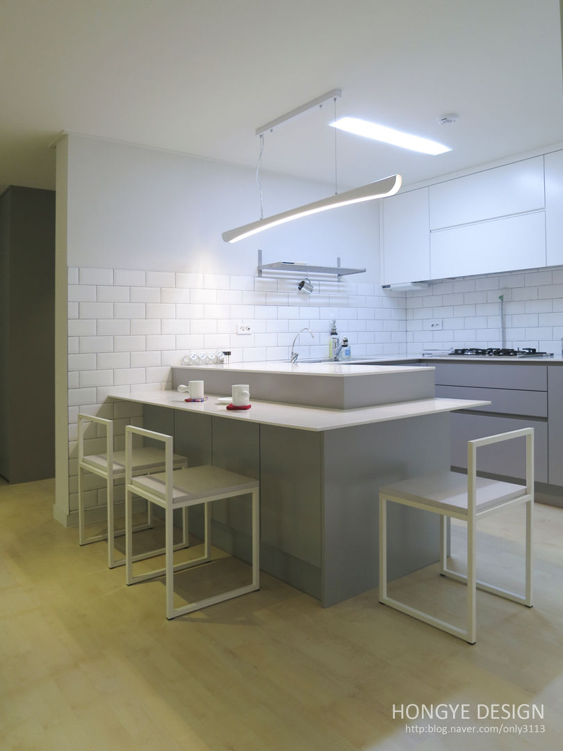 거실의 서재화 , 은혜로운 집 _ 25py, 홍예디자인 홍예디자인 Cocinas modernas: Ideas, imágenes y decoración