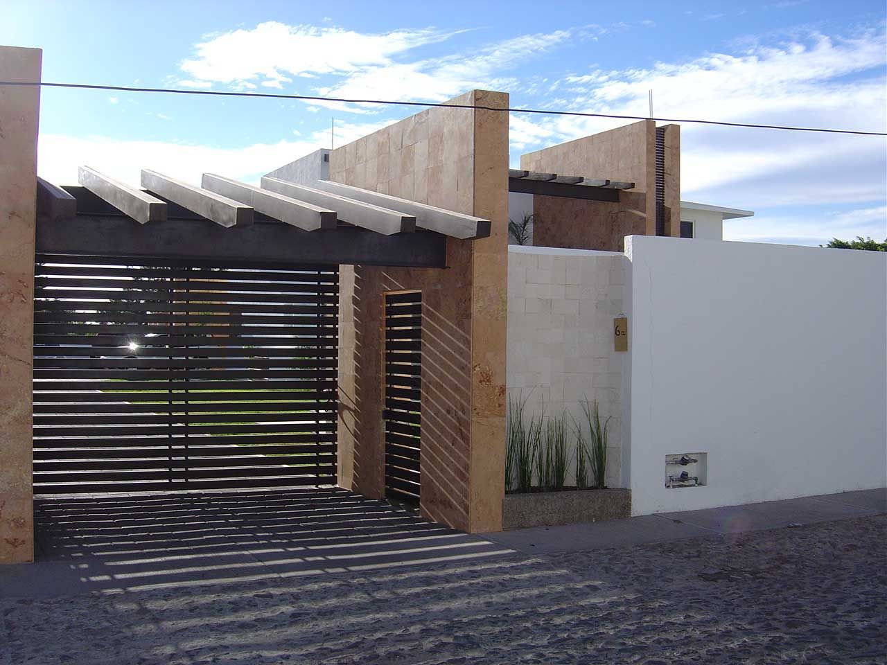 Fachada SANTIAGO PARDO ARQUITECTO Casas unifamiliares
