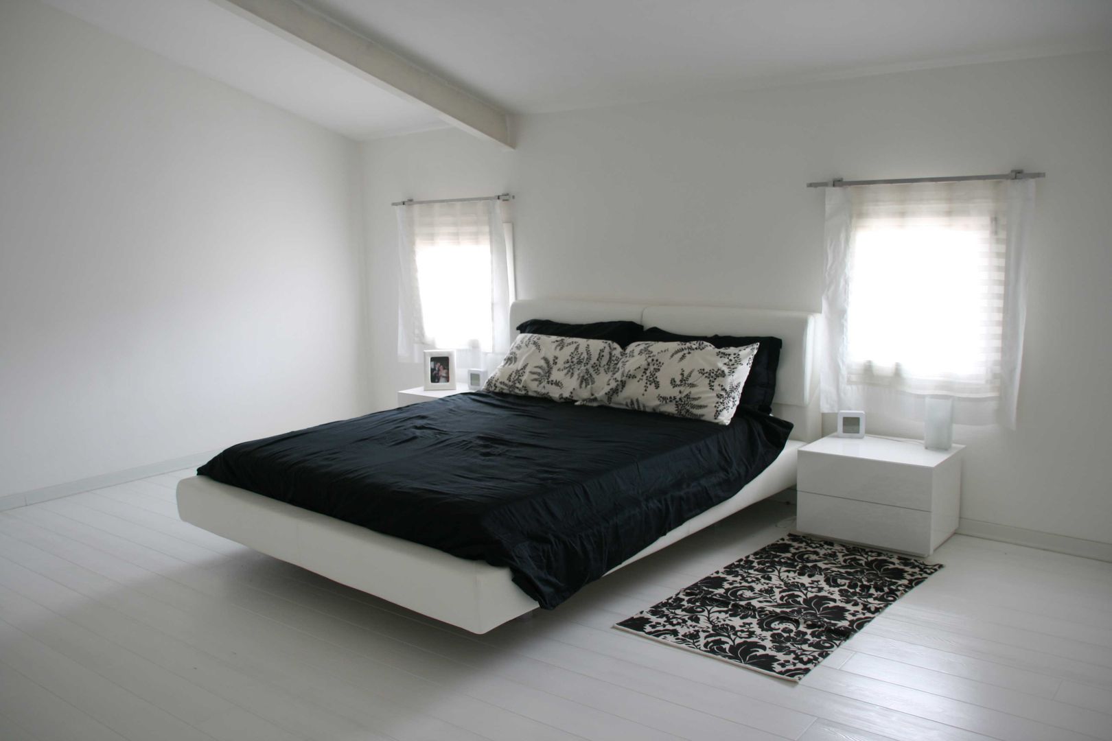 Riqualificazione e arredo casa privata, Studio HAUS Studio HAUS Modern style bedroom