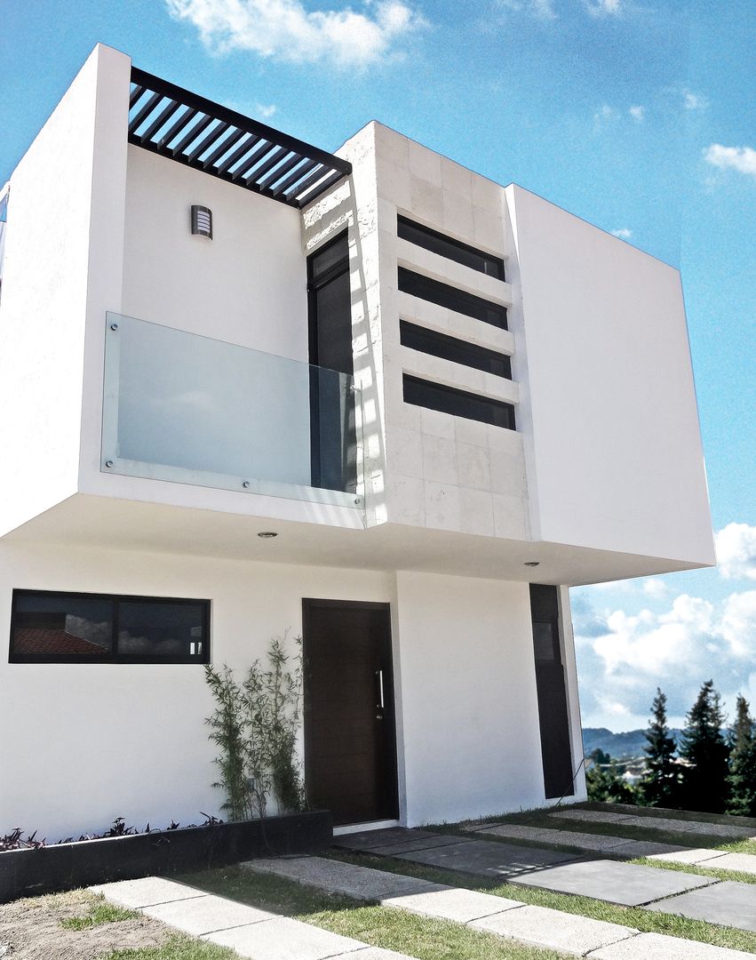 Fachada frontal CONSTRUCTORA ARQOCE Casas modernas: Ideas, diseños y decoración