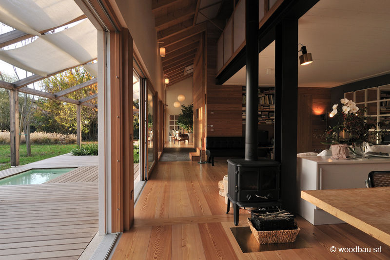 Casa in legno nella campagna veneta, Woodbau Srl Woodbau Srl Salon classique Bois Effet bois