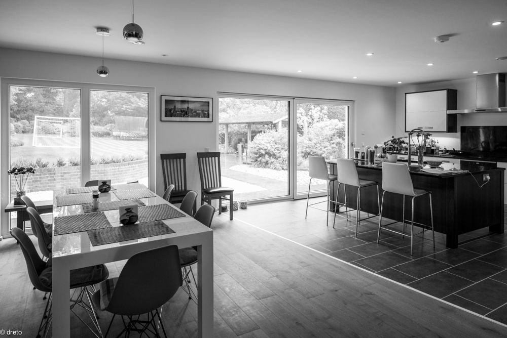 Dining room The Chase Architecture Modern dining room Engineered Wood Transparent