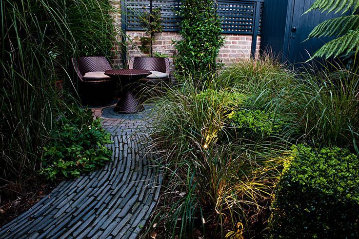 Maltese Road - Copyright John Glover Aralia Modern Garden Bricks contemporary garden design,garden design,contemporary garden,roof terrace,contemporary roof terrace,lighting,garden lighting,art,garden art,outdoor art,outdoor seating,love nest,outdoor sofa,outdoor bed,garden seating