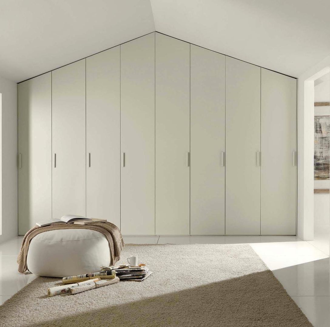 Armadio mansarda moderno, CORDEL s.r.l. CORDEL s.r.l. Modern style bedroom Wood Wood effect Wardrobes & closets