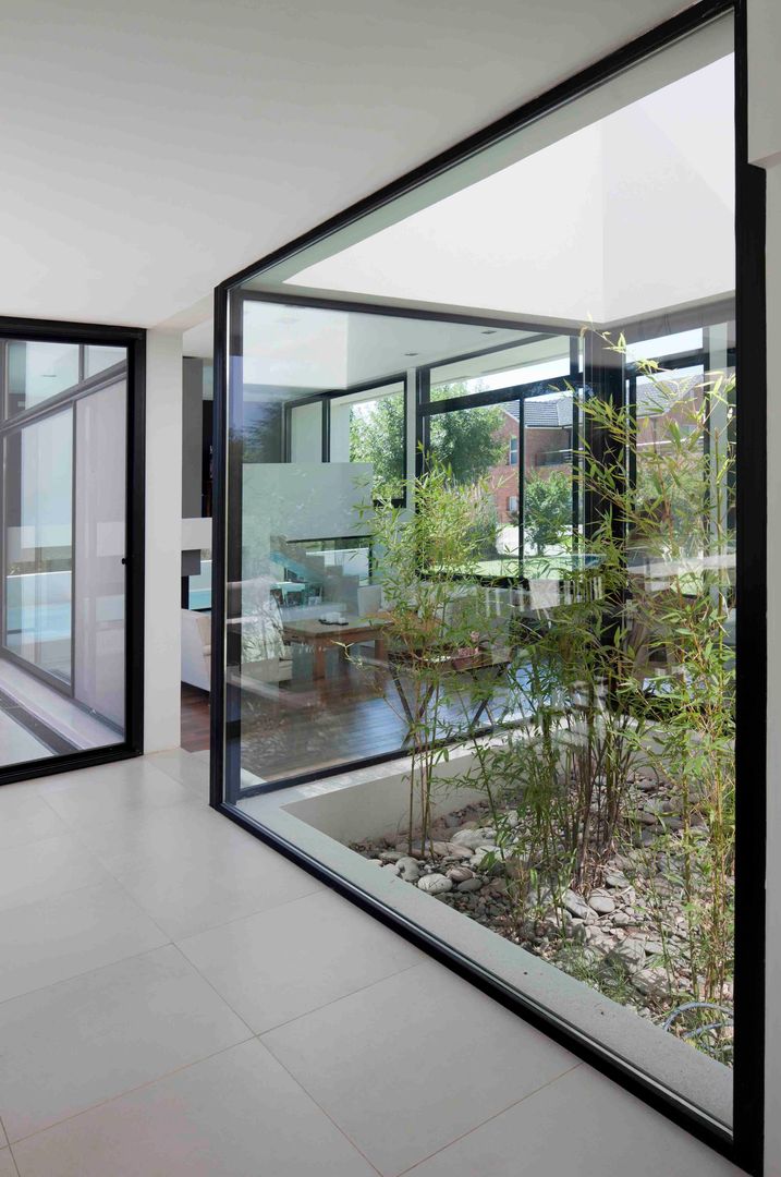 Casa Grand Bell, Remy Arquitectos Remy Arquitectos Jardines de estilo moderno