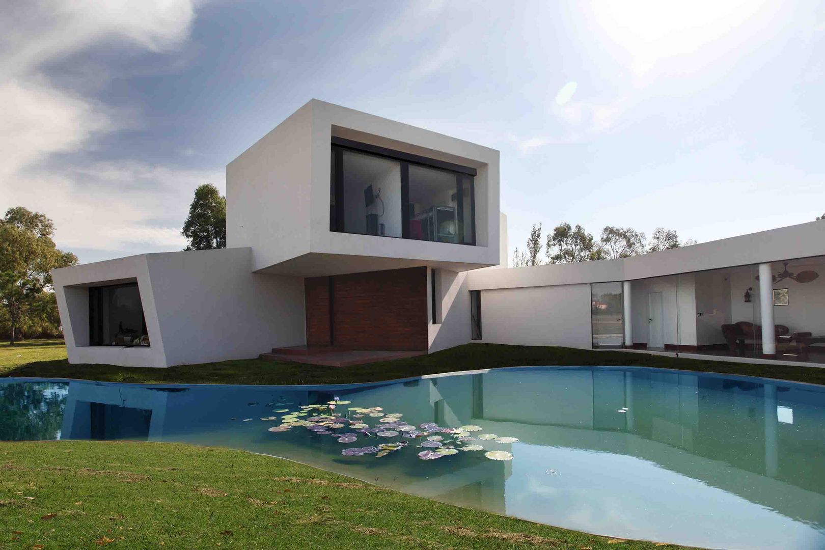 Casa Orquidea, Remy Arquitectos Remy Arquitectos Hồ bơi phong cách hiện đại