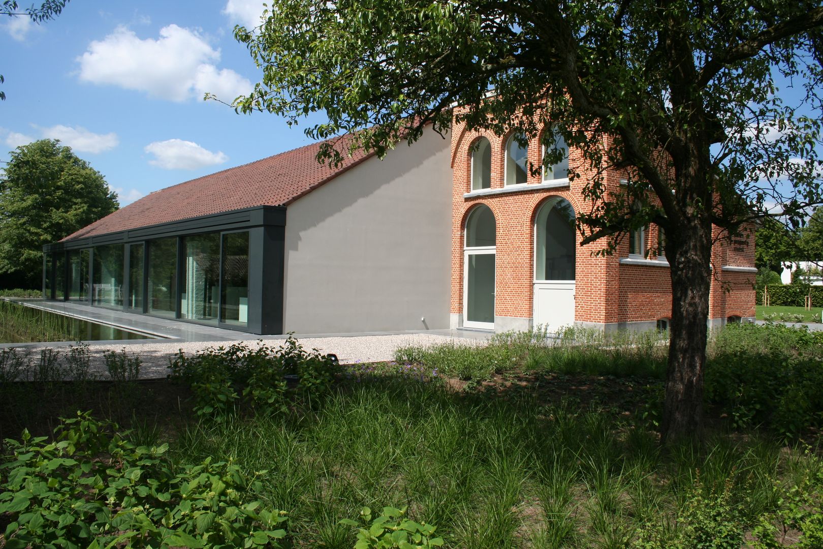 Tiendenschuur Van Mol Schoten, DI-vers architecten - BNA DI-vers architecten - BNA Moderne huizen