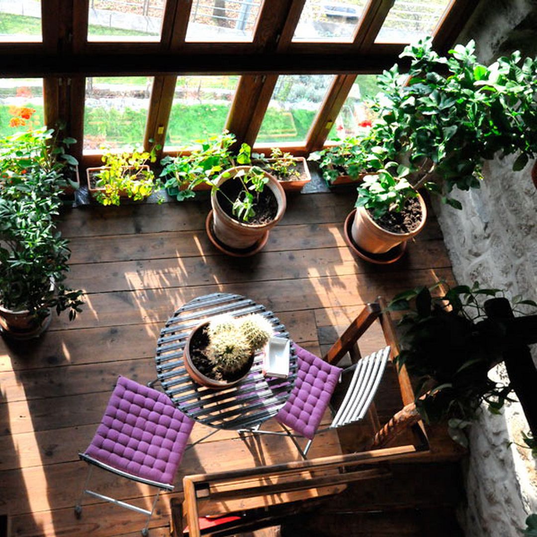 La casa del sasso ArchitetturaTerapia® Giardino d'inverno in stile rurale Legno Effetto legno giardino dinverno, veranda, oasirelax