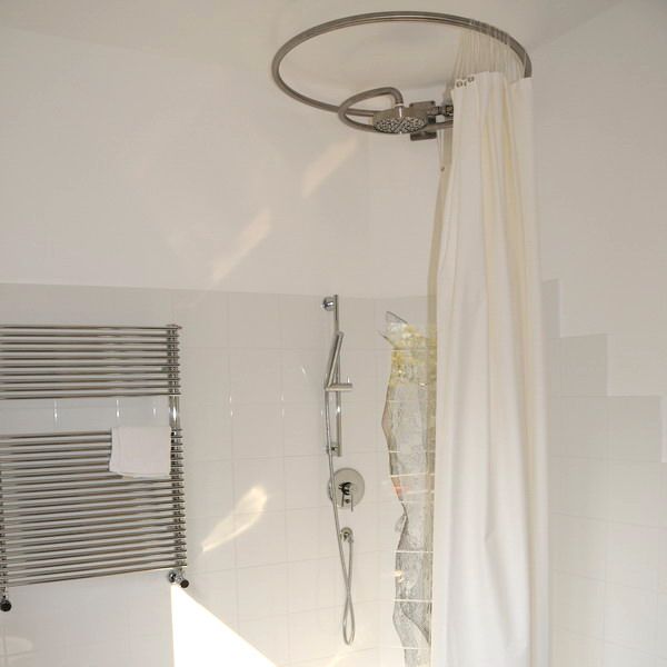 Appartamento I+R, ArchitetturaTerapia® ArchitetturaTerapia® Minimalist style bathrooms Iron/Steel