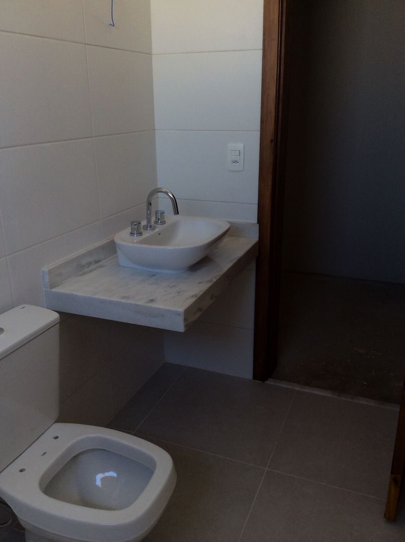 Banho Suite Vanda Carobrezzi - Design de Interiores Banheiros rústicos