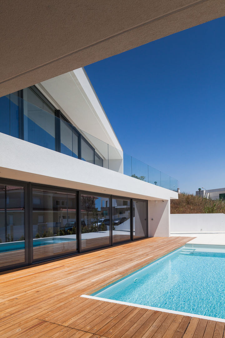 JC House JPS Atelier - Arquitectura, Design e Engenharia Casas modernas