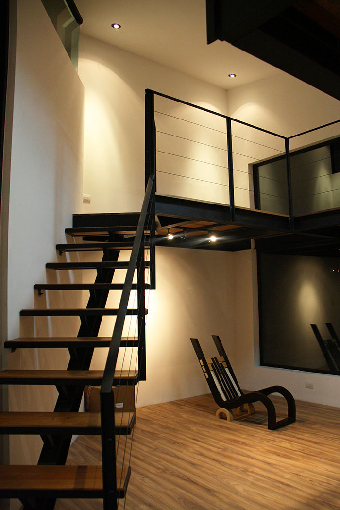 Escalera en biblioteca Narda Davila arquitectura Oficinas Madera Acabado en madera