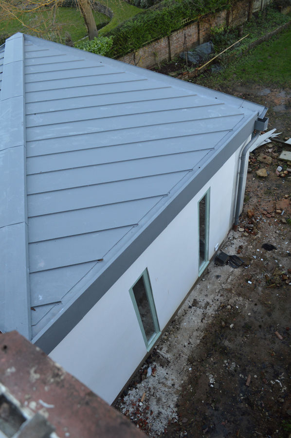 Butterfly Zinc-clad Roofs for the New Extension ArchitectureLIVE Case moderne Alluminio / Zinco butterfly zinc roof