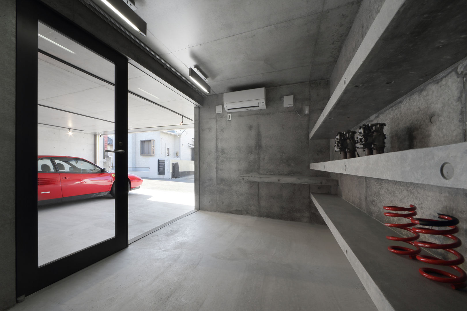 宮城のガレージハウス, 有限会社Kaデザイン 有限会社Kaデザイン Modern garage/shed Stone