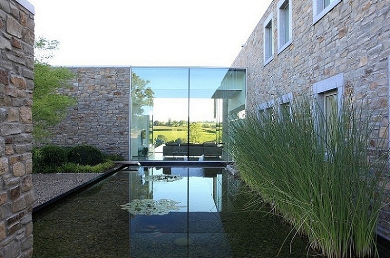 Le Moellon, Luc Spits Architecture Luc Spits Architecture Jardines modernos Albercas y estanques