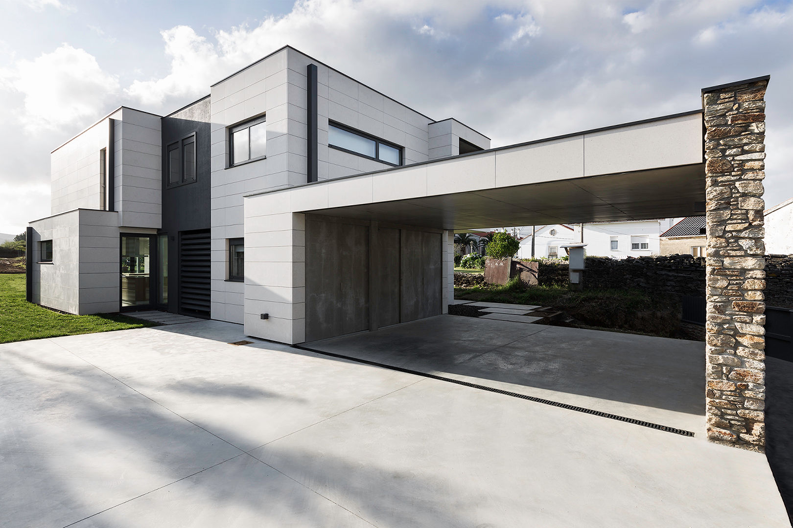 Vivienda en Mugardos, AD+ arquitectura AD+ arquitectura Eengezinswoning Steen