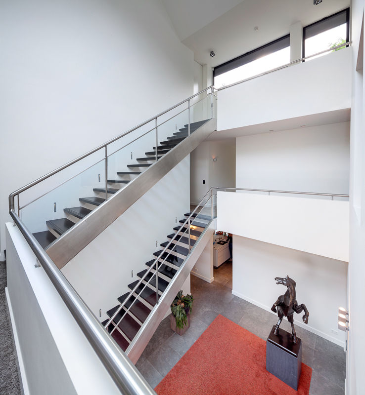 homify Modern corridor, hallway & stairs