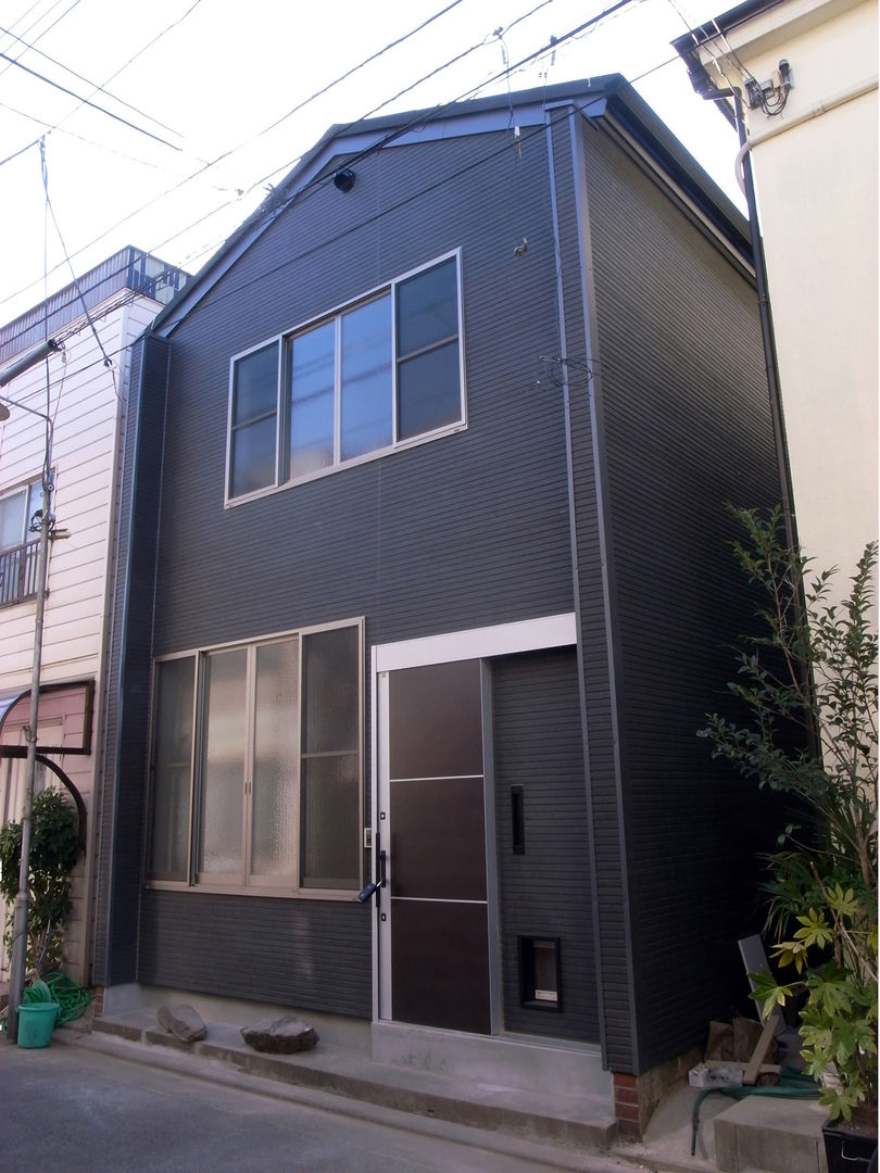二世帯住宅の家 ㈱姫松建築設計事務所 モダンな 家 二世帯住宅