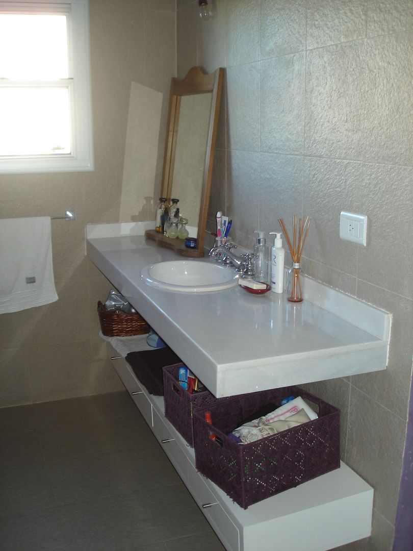 Baño dormitorio principal Fainzilber Arqts. Baños de estilo rústico