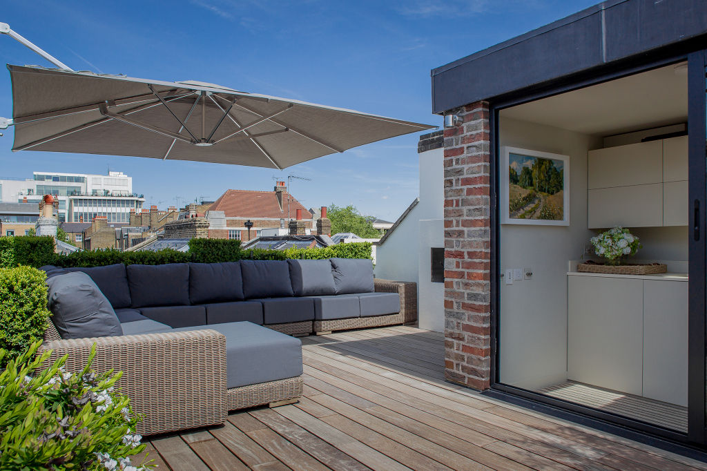 ​The roof terrace at the Chelsea House. Nash Baker Architects Ltd Varandas, alpendres e terraços clássicos