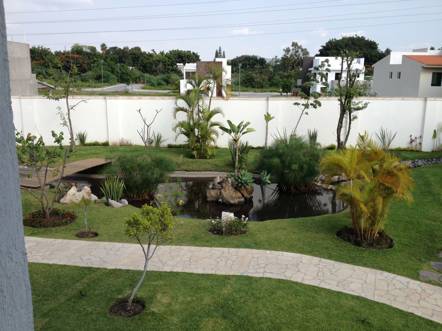 Bosques de Jiutepec, DYE-ARQUITECTURA DYE-ARQUITECTURA Single family home Limestone