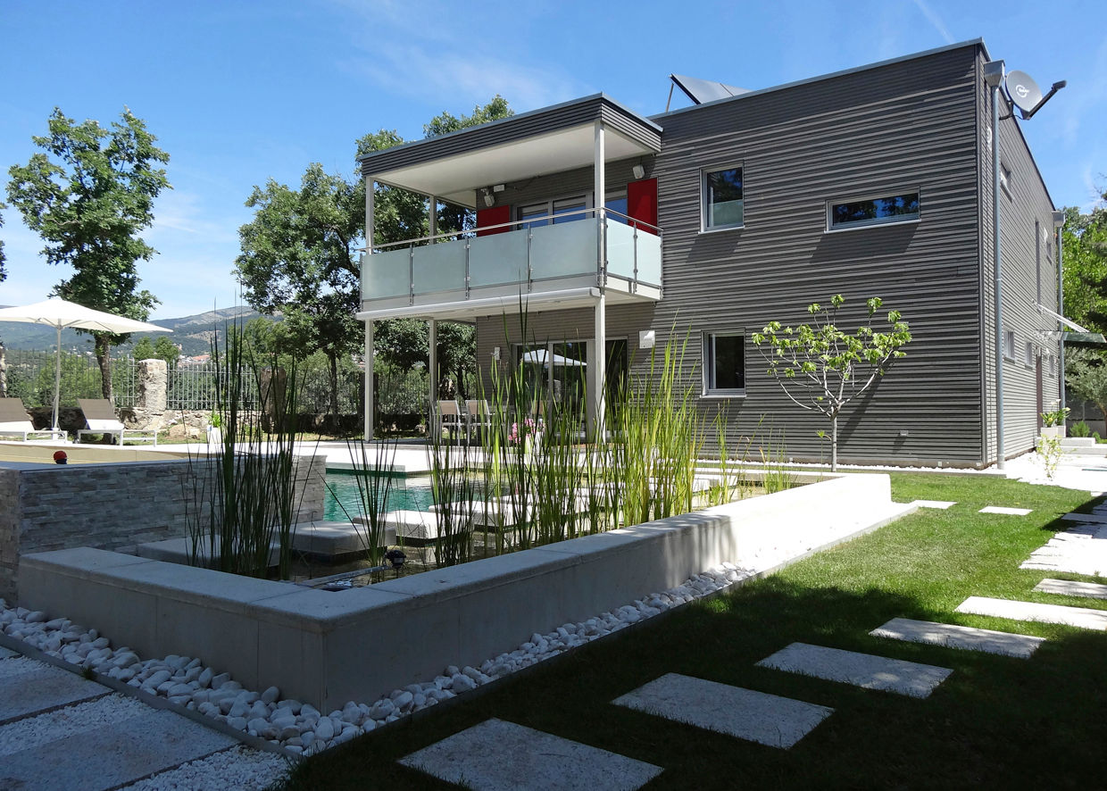 casa en Miraflores de la Sierra, Construir con Baufritz Construir con Baufritz Casas modernas Madeira Acabamento em madeira