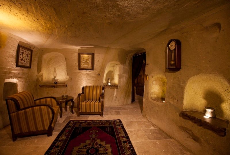 Emine Hanım evi Öncesi ve Sonrası, Kayakapi Premium Caves - Cappadocia Kayakapi Premium Caves - Cappadocia ラスティックデザインの リビング