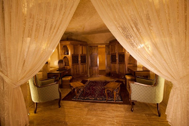 Kuşçular Konağı Öncesi Ve Sonrası, Kayakapi Premium Caves - Cappadocia Kayakapi Premium Caves - Cappadocia Rustic style living room